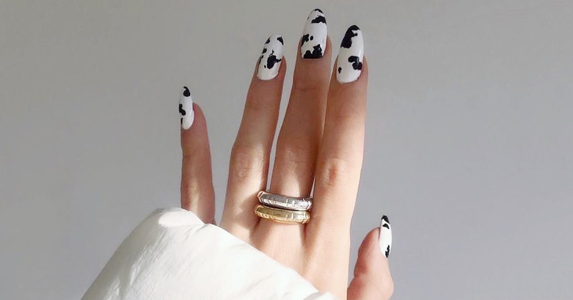 Abstract cow print nails – Scratch